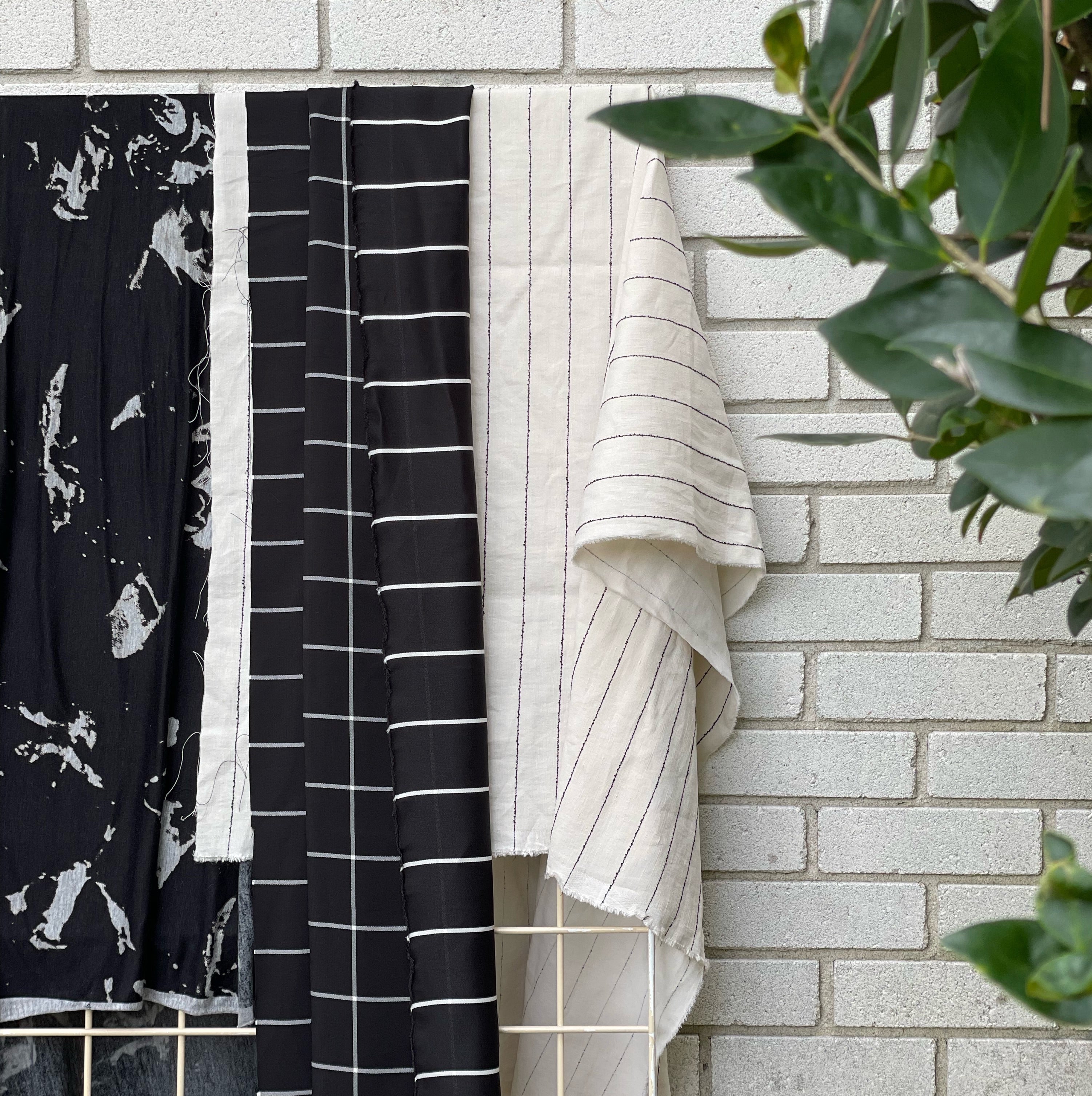 White & Black Fabric Measure a fabric parlor